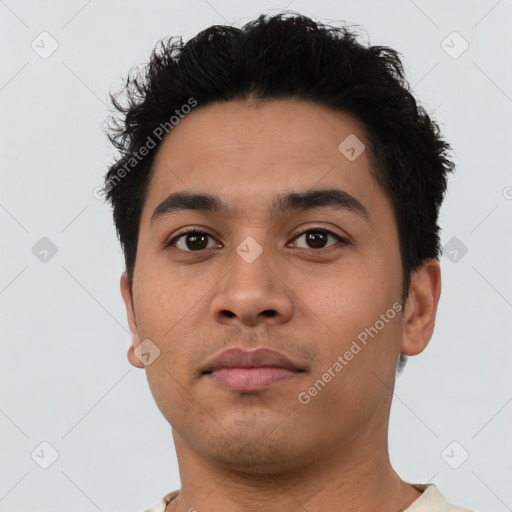 Neutral latino young-adult male with short  black hair and brown eyes