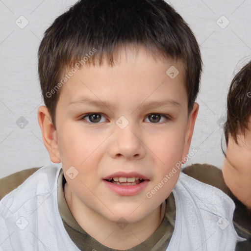 Joyful white child male with short  brown hair and brown eyes