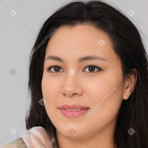 Joyful asian young-adult female with long  brown hair and brown eyes