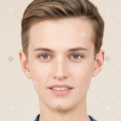 Joyful white young-adult male with short  brown hair and grey eyes