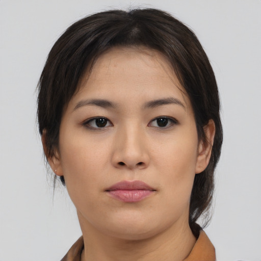 Neutral asian young-adult female with medium  brown hair and brown eyes