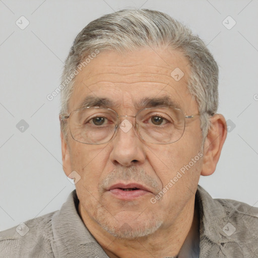 Neutral white middle-aged male with short  gray hair and brown eyes