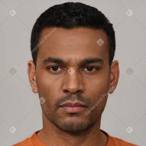 Neutral latino young-adult male with short  black hair and brown eyes