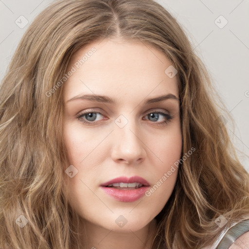 Joyful white young-adult female with long  brown hair and green eyes