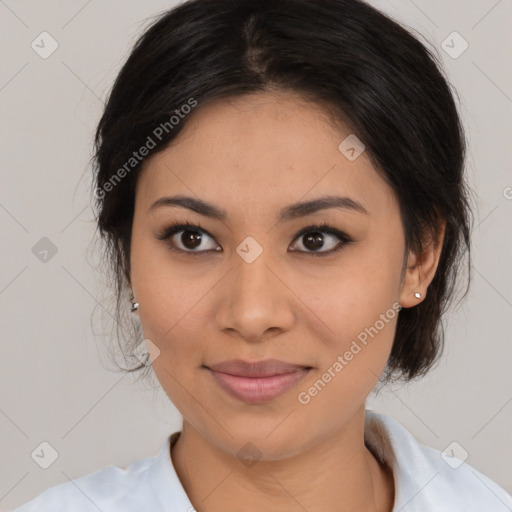 Joyful latino young-adult female with medium  brown hair and brown eyes