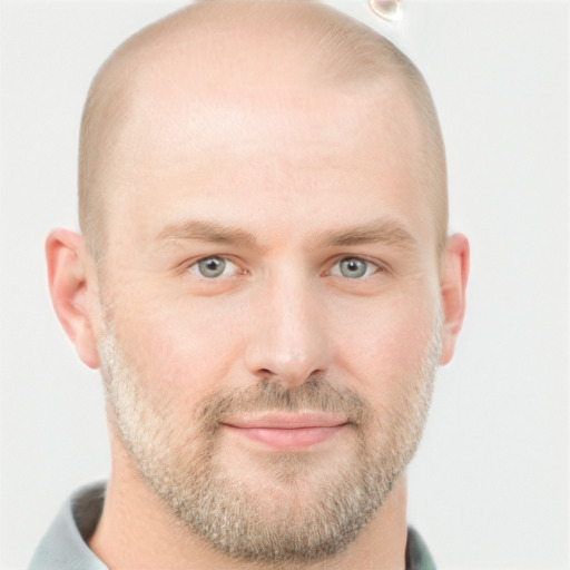 Joyful white adult male with short  brown hair and grey eyes