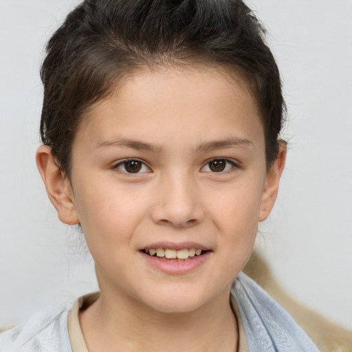 Joyful white child female with short  brown hair and brown eyes