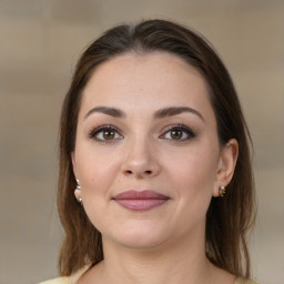 Joyful white young-adult female with medium  brown hair and brown eyes