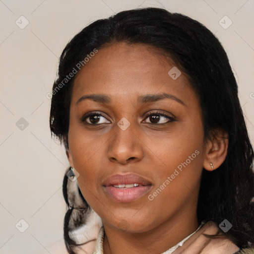 Joyful black young-adult female with medium  black hair and brown eyes