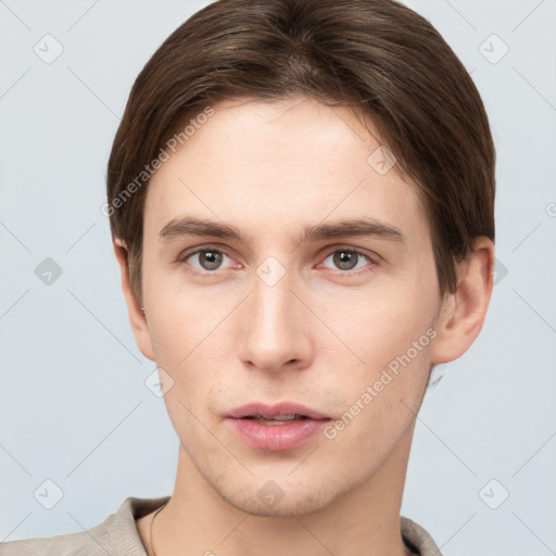 Neutral white young-adult male with short  brown hair and grey eyes