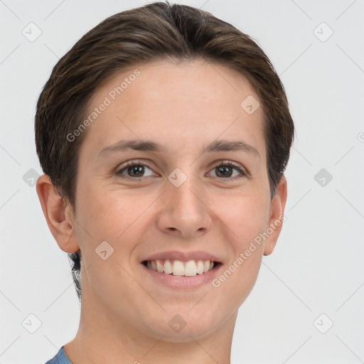 Joyful white young-adult female with short  brown hair and grey eyes