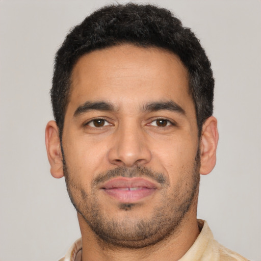 Neutral latino young-adult male with short  black hair and brown eyes