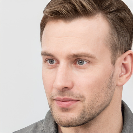 Neutral white young-adult male with short  brown hair and grey eyes