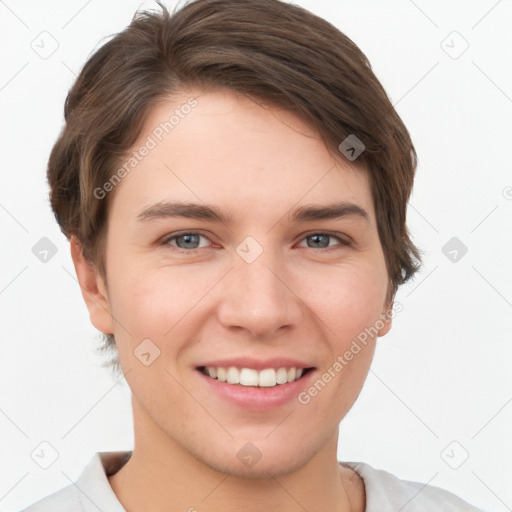 Joyful white young-adult female with short  brown hair and grey eyes