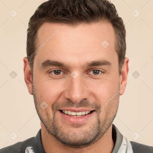 Joyful white young-adult male with short  brown hair and brown eyes