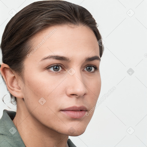 Neutral white young-adult female with short  brown hair and grey eyes