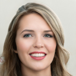 Joyful white young-adult female with long  brown hair and blue eyes