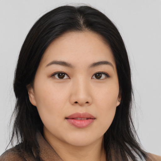 Neutral asian young-adult female with long  brown hair and brown eyes