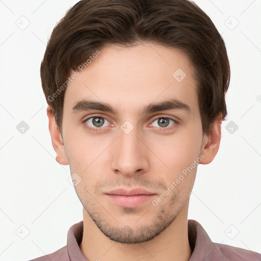 Neutral white young-adult male with short  brown hair and brown eyes