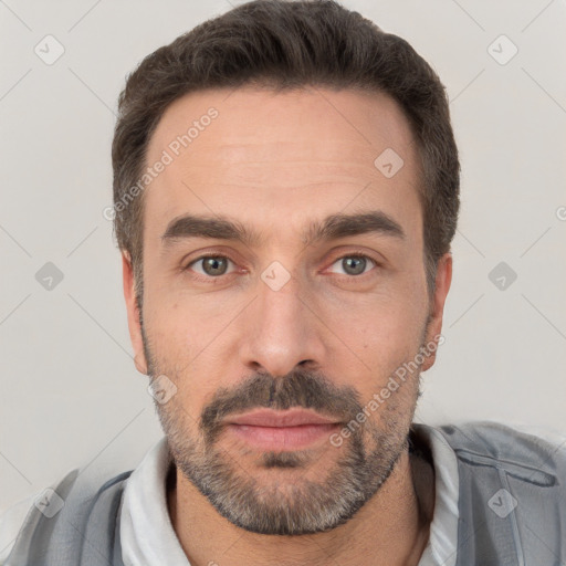 Neutral white adult male with short  brown hair and brown eyes