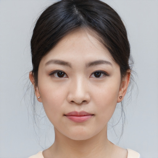 Neutral asian young-adult female with medium  brown hair and brown eyes