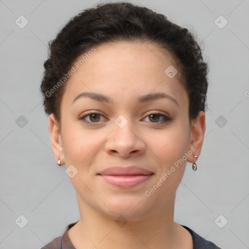 Joyful latino young-adult female with short  brown hair and brown eyes