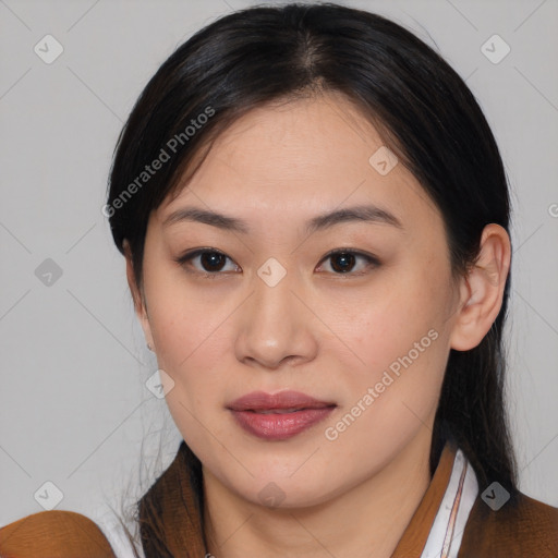 Joyful asian young-adult female with medium  black hair and brown eyes