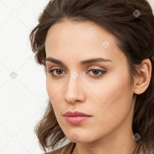 Neutral white young-adult female with long  brown hair and brown eyes