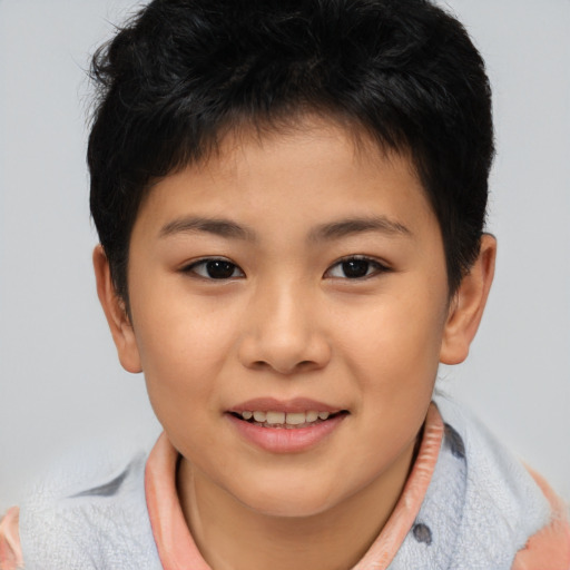 Joyful asian child female with short  brown hair and brown eyes