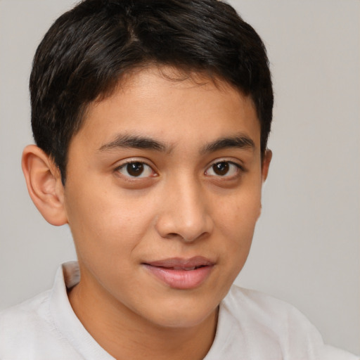 Joyful latino young-adult male with short  brown hair and brown eyes