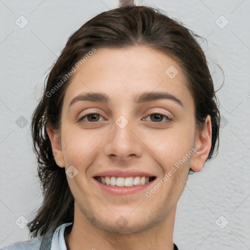 Joyful white young-adult female with medium  brown hair and brown eyes