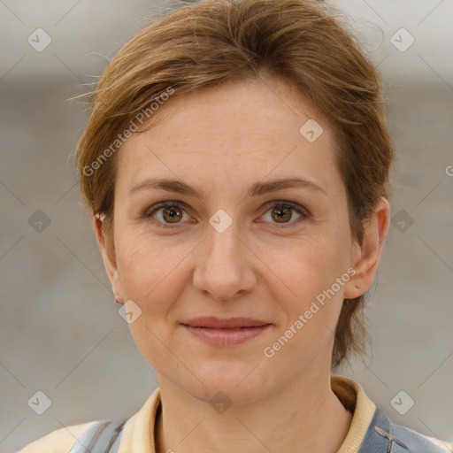 Joyful white adult female with medium  brown hair and grey eyes