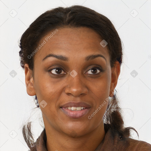 Joyful black young-adult female with long  brown hair and brown eyes