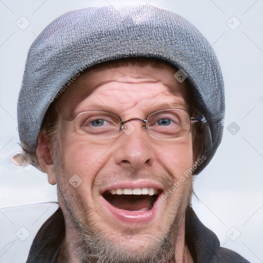 Joyful white adult male with short  brown hair and blue eyes