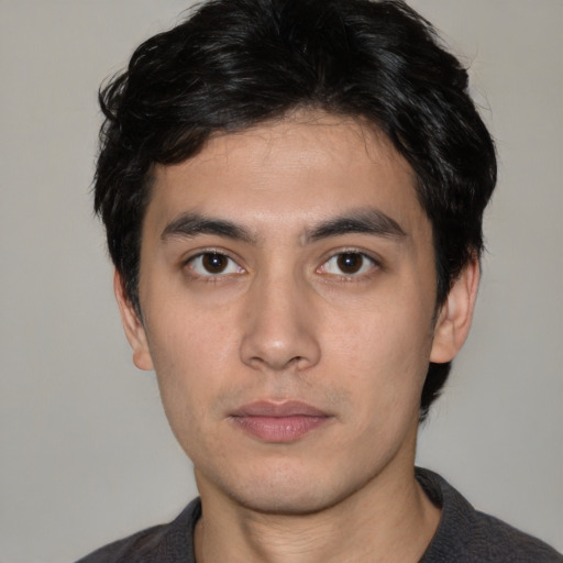 Neutral white young-adult male with short  black hair and brown eyes
