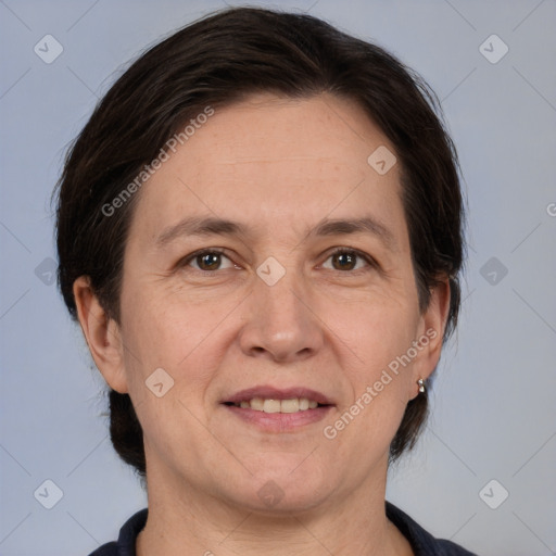 Joyful white adult female with medium  brown hair and brown eyes