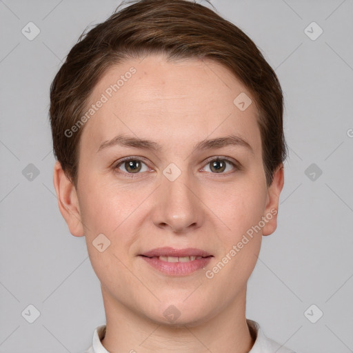 Joyful white young-adult female with short  brown hair and grey eyes