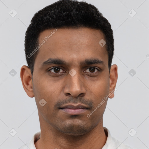 Neutral latino young-adult male with short  black hair and brown eyes