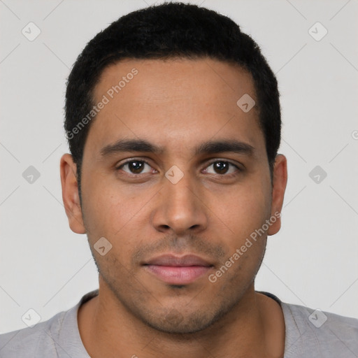 Neutral latino young-adult male with short  black hair and brown eyes