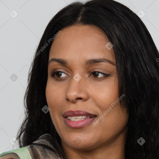 Joyful latino young-adult female with long  black hair and brown eyes