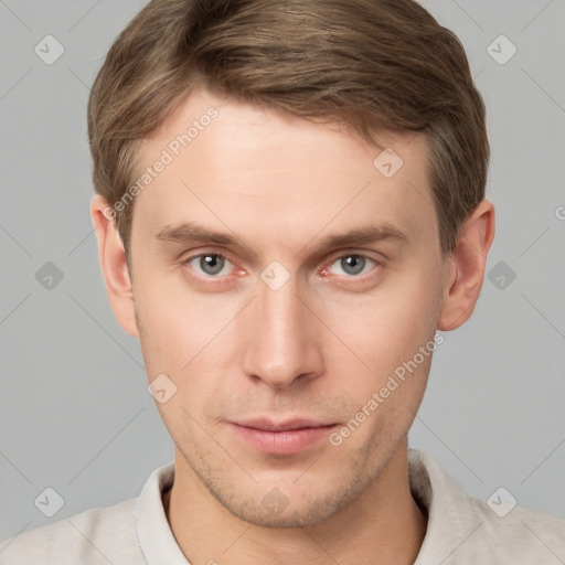 Neutral white young-adult male with short  brown hair and grey eyes