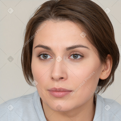 Neutral white young-adult female with medium  brown hair and brown eyes