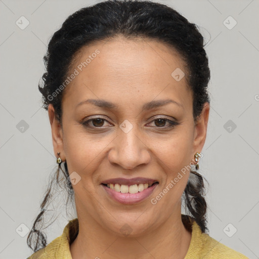Joyful latino adult female with short  brown hair and brown eyes