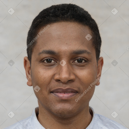 Joyful black young-adult male with short  black hair and brown eyes