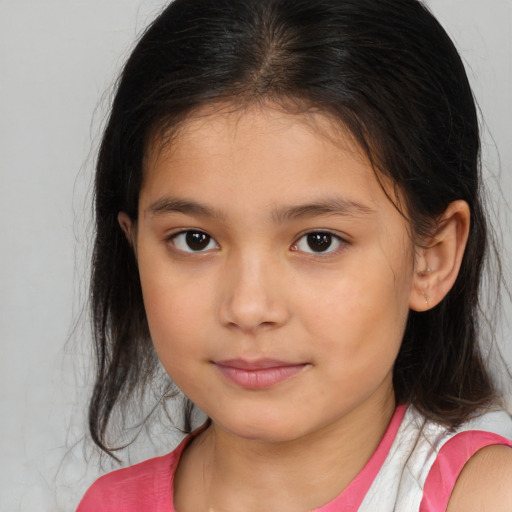 Joyful white child female with medium  brown hair and brown eyes