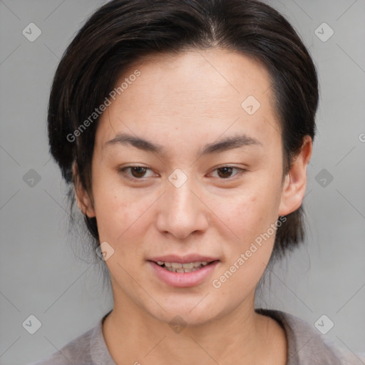 Joyful asian young-adult female with medium  brown hair and brown eyes