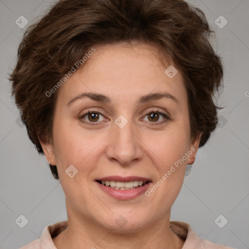 Joyful white adult female with short  brown hair and brown eyes