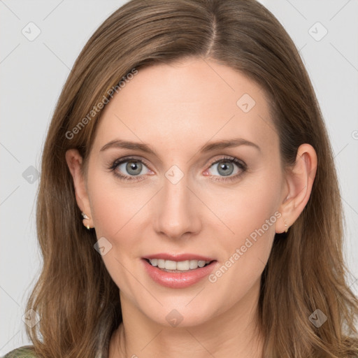 Joyful white young-adult female with long  brown hair and green eyes