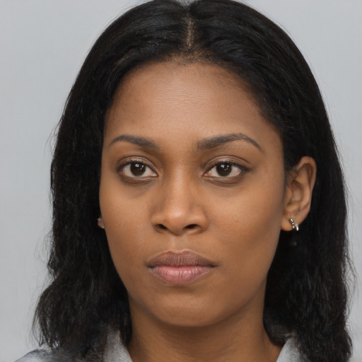 Neutral black young-adult female with long  black hair and brown eyes