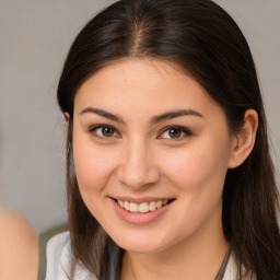 Joyful white young-adult female with medium  brown hair and brown eyes